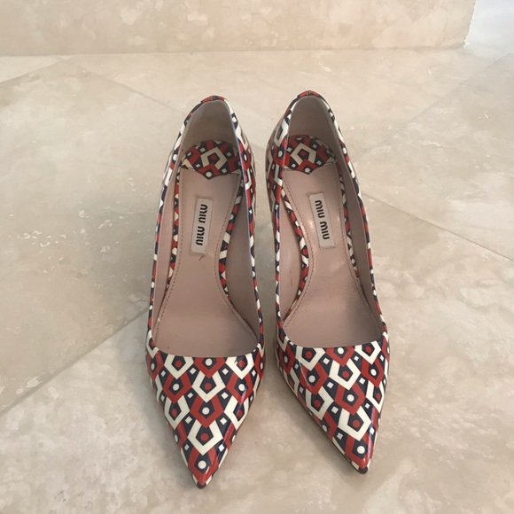 Miu Miu Shoes - Miu Miu leather pumps with geometric pattern.